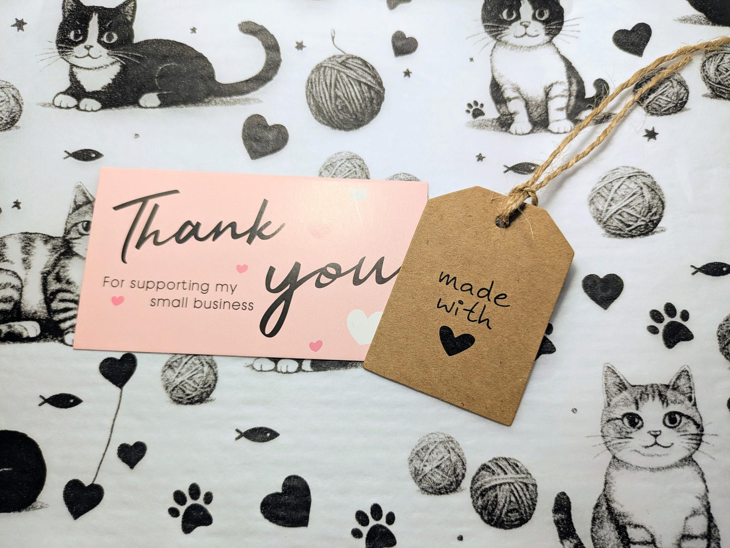 Personalised cat treat box with black and white cat illustrations, thank you card, and rustic gift tag.
