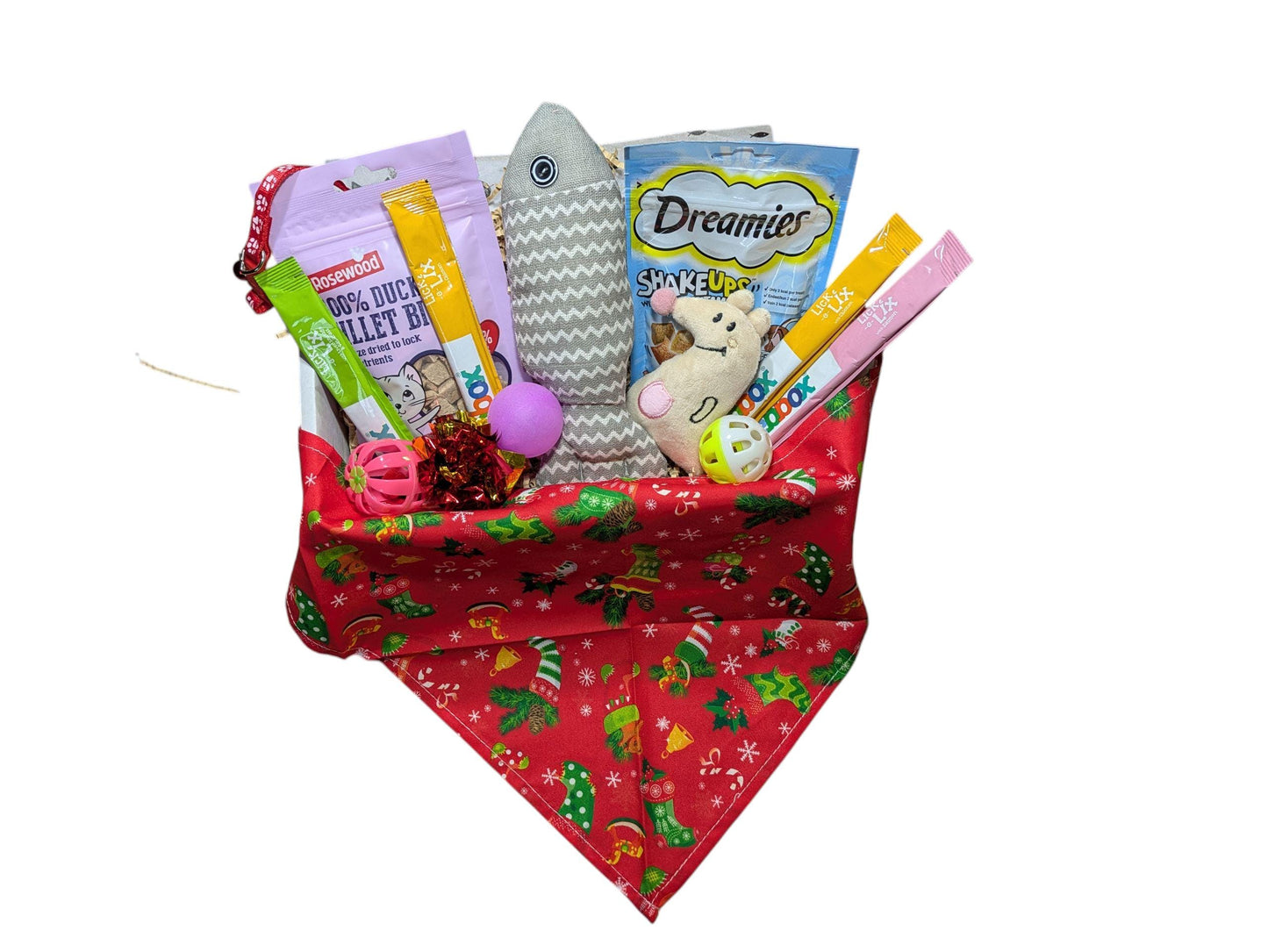 Red Christmas-themed fabric gift box filled with cat treats, toys, and a small plush mouse with a bell.